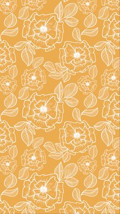 an orange and white flower pattern on a yellow background