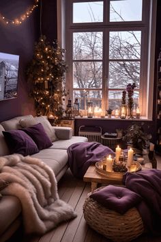 a living room filled with furniture and candles