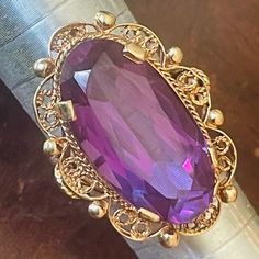 Antique 14k Yellow Gold Filigree Ring W/ Huge 13ct Purple Sapphire 8.1 Grams Sz 6.75. Ring Is In Nice Condition Overall, With Minor Signs Of Wear/ Age. Sapphire Has Been Professionally Tested With A Presidium Gem Tester And Is In Nice Condition, It Measures 21mm X 12mm. Ring Is Not Marked 14k But Has Been Professionally Tested With Acid. Very Unique Design! I Will Be Shipping This To The Us Only. Thanks Victorian 14k Gold Purple Rings, Antique 14k Yellow Gold Amethyst Ring, Antique Amethyst Yellow Gold Jewelry, Antique Gold Amethyst Ring Hallmarked, Victorian 14k Gold Amethyst Ring Collectible, Filigree Ring Gold, Purple Sapphire, Gold Filigree, Filigree Ring