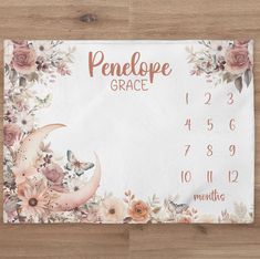 a place mat with flowers and a crescent on it that says penelope grace