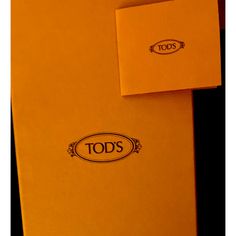 an orange folder with the words todd's on it