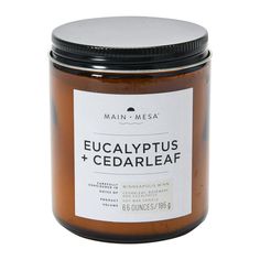 a jar of eucalyptus and cedar leaf jam with a label on the lid that says eucalyptusplus + cedar leaf