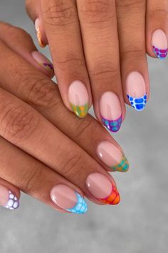 Spring is the perfect season to experiment with various nail trends, whether you prefer bold and vibrant shades or chic minimalist designs. Step out of your comfort zone by trying unique styles like cow print, spirals, or intricate nail stickers. IG: peachinails Patterned French Tip Nails, Design Ongles Courts, Colored Nail Tips, Nails Colorful, Green French, Colorful French, Nails Green, May Nails, Pointed Nails