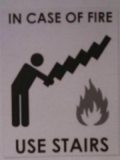 a sign that says in case of fire use stairs