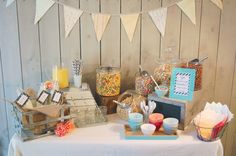 a table topped with lots of candy and candies