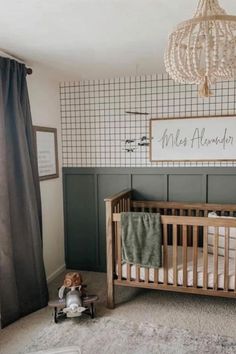 a baby's room with a crib, bed and window