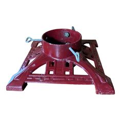 an old fashioned red cast iron stove on a white background