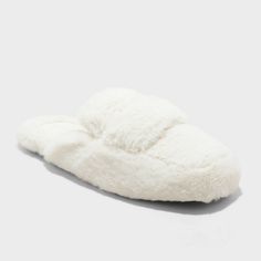 Step into cozy comfort with these Astoria Faux-Fur Loafer Slippers from Auden™. Designed with a square closed toe, these loafer slippers feature cushioned insoles and faux-fur uppers to hug your feet in luxurious comfort throughout the day. The slip-on style allows for easy on and off, and the indoor/outdoor outsole allows for versatile wear. Auden™: Comfort true to every shape & hue. Soft Cream Round Toe Slippers, Cream Slip-on Slippers With Cushioned Footbed, Cream Synthetic Slip-on Slippers, Cream Slip-on Synthetic Slippers, Comfortable Cream Synthetic Slippers, Cream Flat Slippers With Cushioned Footbed, Cream Textured Slip-on Slippers, Cozy White Closed Toe Slippers, White Slippers With Textured Footbed