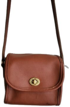 Classic Soft Leather Satchel For On-the-go, Classic Saddle Bag With Adjustable Strap For On-the-go, Classic Crossbody Saddle Bag For On-the-go, Classic Everyday Bags With Snap Closure, Classic Soft Leather Saddle Bag For On-the-go, Classic Cognac Shoulder Bag For Travel, Classic Cognac Soft Leather Shoulder Bag, Brown Satchel With Turn-lock Closure For Daily Use, Classic Crossbody Satchel With Detachable Strap