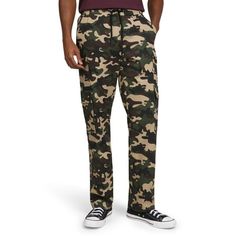 Slip into these Dogg Supply Men's and Women's Pull-On Ripstop Cargo Pants with Pockets. With plenty of pockets for storage, these men's cargo pants are a must-have for any wardrobe. These lightweight pants are perfect for all-day wear. Pair these men's pants with a classic crewneck t-shirt or a Snoopified graphic tee for the ultimate laidback look. With these pants, it's easy to pull on and go thanks to the elastic waistband. A variety of pockets gives you tons of storage to hold your essentials Camouflage Cotton Joggers With Pockets, Casual Camouflage Cargo Pants For Hiking, Casual Camouflage Cotton Sweatpants, Casual Camouflage Parachute Pants For Outdoor, Camouflage Cotton Pants For Outdoor Activities, Utility Style Cotton Sweatpants For Outdoor Activities, Cotton Camouflage Pants For Outdoor Activities, Casual Camouflage Cotton Parachute Pants, Camouflage Cargo Pants For Outdoor