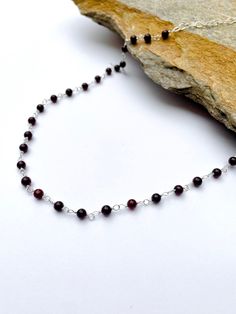 "Garnet necklace. -4mm Garnet beads. -Sterling silver wire. -Sterling silver lobster clasp. Necklace length is 16, 18, 30, 22\"  + 3 inches sterling silver extended chain. Garnet is a stone of prosperity and abundance, encouraging gratitude and service to others.  Note: Since the beads are natural and unique, beads may not have the same pattern for every single beads with the provided sample pictures. Please be understanding. Thanks a lot! **Custom orders welcome." Beaded Necklace With Sterling Silver Clasp As Gift, Sterling Silver Beaded Necklace Gift, Beaded Necklaces With Sterling Silver Clasp As Gift, Gift Beaded Necklaces With Sterling Silver Clasp, Service To Others, Prosperity And Abundance, Single Bead, Clasp Necklace, Garnet Necklace