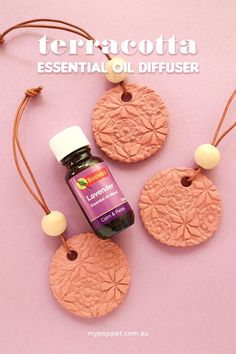 an image of essential oil diffuser on a pink background with the words terracotta essential oil diffuser