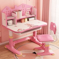 a child's desk and chair in a pink room