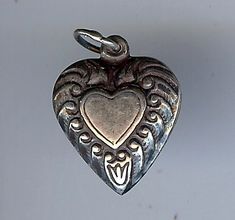 "This vintage charm measures approximately 3/4\" (1.9 cm) by 9/16\" (1.5 cm). Weighs 1.3 grams. Marked STERLING. Great condition." Heart Flowers, Puffy Heart Charms, Violet Flower, Puffy Heart, Vintage Heart, Green Enamel, Beaded Dangles, Silver Heart, Vintage Charms