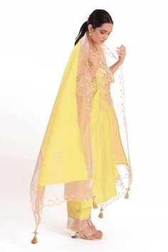 Pastel yellow kurta with embroidered banarasi jacquard tissue yoke. Paired with a slub silk pant and chanderi dupatta with scalloped tissue detailing. - Aza Fashions Designer Yellow Tissue Silk Kurta, Yellow Tissue Silk Dupatta, Fitted Yellow Kurta With Sheer Dupatta, Yellow Chanderi Kurta With Cutdana, Yellow Semi-stitched Tissue Silk Dupatta, Yellow Palazzo Set With Sheer Dupatta, Yellow Cutdana Semi-stitched Kurta, Kurta With Pants, Silk Pants