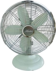 a white table top fan with the word hunter on it's front and side blades