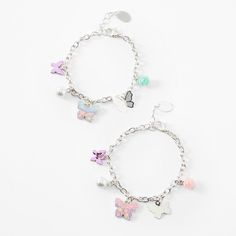 Show your bestie how to flutter in style in these butterfly charm bracelets. This set includes one bracelet for you and one for her, each with with a variety of butterfly charms. Pack Size: 2 Length: 6" + extender Closure: Lobster clasp Material: Metal - Claire's Best Friends Butterfly Charm Bracelets - 2 Pack Adjustable Metal Bracelets With Butterfly Charm, Adjustable Metal Bracelet With Butterfly Charm, Adjustable Butterfly Charm Bracelet, Adjustable Silver Charm Bracelet With Butterfly, Silver Adjustable Charm Bracelet With Butterfly, Adjustable Silver Beaded Bracelet With Butterfly Charm, Butterfly Stuff, Clear Butterfly, Claire's Accessories