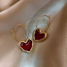 Show your love and appreciation with these adorable Red Heart Pendant Earrings. Perfect as a gift for someone you love and admire, or a treat for yourself.  Gold & alloy plating  High-quality enamel  Hoop wire closure  Hypoallergenic, lead & nickel free  If you aren't in LOVE with your purchase, please let us know within 30 days of receiving your item, and you'll Red Heart Earrings, Brown Earrings, Unusual Earrings, Women Earrings, Jewelry Lookbook, Earrings Women, Trendy Earrings, Winter Trends, Jewelry Women