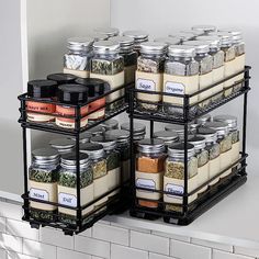 three tiered spice rack holding spices and herbs