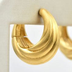 Forme Huggie Hoops – Goldmakers Fine Jewelry Gold-tone Clip-on Hoop Earrings In Brass, Handmade Gold Brass Huggie Earrings, Handmade Gold Huggie Earrings In Brass, Gold Brass Huggie Earrings For Formal Occasions, Gold Small Hinged Hoop Earrings, Formal Brass Clip-on Hoop Earrings, Brass Hoop Earrings With Ear Wire For Formal Occasions, Formal Brass Hoop Earrings With Ear Wire, Yellow Gold Brass Hoop Earrings With Lever Back