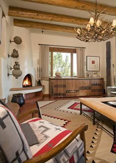 a living room filled with furniture and a fire place