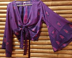 Handmade silk top, wide Japanese bell sleeves, one size fits all. India. 100% silk. Beach Blouse With Tie Sleeves And Long Sleeves, Purple Silk Long Sleeve Tops, Traditional Silk Tops For Summer, Long Sleeve Purple Silk Tops, Traditional Long Sleeve Tops With Blouson Sleeves, Silk V-neck Blouse For Vacation, Traditional Long Sleeve Purple Tops, Free Size Long Sleeve Blouse For Vacation, Vacation Blouse With Long Blouson Sleeves