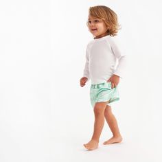 These two swim trunks are just what your little guy needs to have a blast on a sunny day of water fun. Whether you're on a beach getaway, chilling by the pool, or having water adventures at home, these swim trunks keep your baby boy or toddler boy protected from the sun with UPF 50+ fabric and let him move comfortably thanks to the stretchy waistband. Plus, they're a breeze to clean in the washing machine, so you can quickly get ready for the next adventure after each exciting day of play! Our e Beachwear Swim Trunks With Uv Protection For Poolside, Beach Season Swim Trunks With Uv Protection, Playful Swim Trunks For Pool And Beach Season, Swim Trunks With Uv Protection For Beach Season, Summer Vacation Swim Trunks With Uv Protection, Playful Swim Trunks With Upf 50+ For Vacation, Playful Swim Trunks With Built-in Shorts, Uv Protection Summer Swim Trunks For Vacation, Upf 50+ Swim Trunks For Poolside Warm Weather