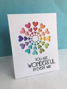 a card with hearts and the words you are wonderful in every way written on it