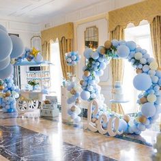 balloons are arranged in the shape of letters