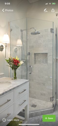 a bathroom with a sink, toilet and shower