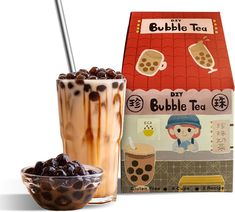 a bubble tea drink next to a box of bubble tea and a bowl of raisins