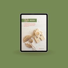 the book is open to show an image of wooden objects