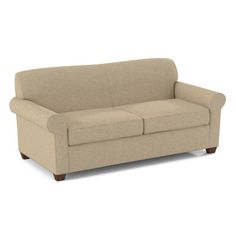 a beige couch sitting on top of a white floor