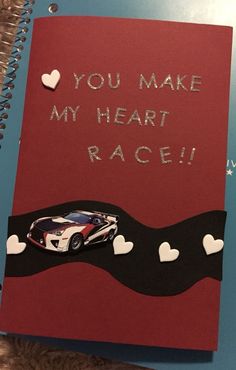 a card that says you make my heart race with a toy car on the road