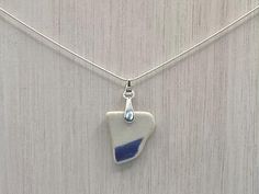 Blue and White Scottish Sea Pottery Pendant Sterling Silver 18" Light Snake Necklace collected from Scotland's coastline then handmade. Pottery Length :22mm WHAT IS SEA GLASS/POTTERY? 💎  Each piece of sea glass or sea pottery is absolutely unique! The sea, sand and beach pebbles help tumble them in the surf over many years.  This weathering process results in smooth and frosted appearance on glass where once they may have had sharper edges.   Each piece of glass or pottery you purchase will hav Ocean-inspired Blue Sea Glass Necklaces, Blue Sea Glass Necklaces For Jewelry Making, Blue Recycled Glass Pendant Necklace, Blue Recycled Glass Nickel-free Necklace, Blue Nickel Free Necklace With Recycled Glass, Pottery Necklace, Beach Pebbles, Sea Sand, Sea Pottery