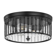 a black ceiling light with clear glass panels on the top and bottom, hanging from an iron rod