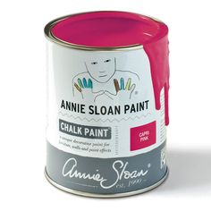 a pink paint can with the words annie sloan paint in white and red on it