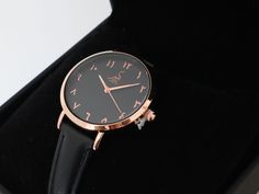 Women Black and Rose Gold Arabic Watch Luxurious watch for you or your loved ones - this watch has black genuine leather straps, with rose gold case and black display.  Japanese Battery Movement 3 ATM Water Resistant Arabic Number Design Genuine Leather Case Size: 32 MM Strap Width: 14 MM Modern Rose Gold Watch As A Gift, Modern Rose Gold Watch As Gift, Modern Rose Gold Watch For Gift, Rose Gold Watches With Metal Dial As Gift, Rose Gold Watch With Metal Dial As A Gift, Gift Rose Gold Watch With Metal Dial, Rose Gold Watches With Subdials As Gift, Stainless Steel Watch Women, Black And Rose Gold