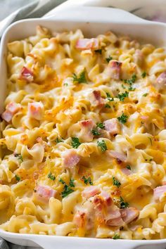 a casserole dish with ham and cheese