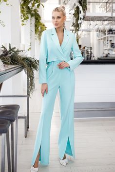 Fabric: Crepe Cotton 65%, Polyester 35% Cropped single breasted (2 button blazer) Notched lapel High rise pants Wide-leg pants Pants hem slit Jacket length: 46 cm/ 18,11 in Sleeve length: 60 cm/ 23,6 in Pants length: 114 cm/ 44,8 in Pants inseam length: 87 cm/ 34,2 in Colors: Black, Olive, Blue, Tiffany-Blue Trouser Suit, Womens Blazer, Jacket Suit, Beautiful Suit, Pantsuits For Women, Black Olive, Mint Blue, Cropped Blazer, Pants Length