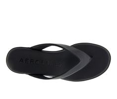 The Aerosoles Isha sandal is an exquisite piece of footwear, crafted with a sleek thong upper and a cushioned footbed inset atop a molded, lightweight unit wedge. Its refined silhouette and superior durability make this sandal perfect for special occasions and everyday wear alike. Experience the luxury of Isha today. Faux Leather upper, Slip on for easy entry,2\ wedge heel, Open round toe with thong post, Synthetic padded footbed, TPR outsole | Women's Aerosoles Isha Wedge Flip-Flops Sandals in Summer T-strap Wedge Sandals With Removable Insole, Black Slip-on Wedge Sandals For Beach, Black Wedge Sandals With 4-inch Heel For Summer, Black Slip-on Wedge Sandals With Textured Sole, Black T-strap Flip Flops With Removable Insole, Wedge Flip Flops, Womens Sandals Wedges, Synthetic Leather, Flip Flop Sandals