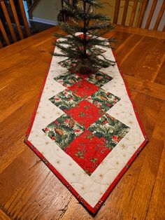 a table runner with a christmas tree on it