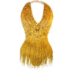 a gold sequin fringe necklace on a mannequin headdress, isolated against a white background