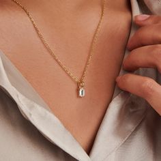 A dainty stone and delicate metallic chain are combined to create this Gold Pendant Necklace in stellar moissanite, your new favorite wear-anywhere accessory.   The birthstone for the month of April is Diamond. Moissanite is referred to as a Diamond simulant. Moissanite disperses light very well and has higher light refraction than Diamond and will appear more brilliant.  Lab-created moissanite stone; Made of 14K gold plated sterling silver.  Pendant size: 4mm x 6mm with 18" chain.   Hypoallerge Gold Birthstone Necklace, April Birthstone Necklace, Light Refraction, Birthstone Charm Necklace, Moissanite Pendant, September Birthstone Jewelry, Moissanite Necklace, Necklace For Her, August Birthstone Jewelry