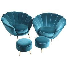 three blue chairs and two stools with gold legs, all in the same color