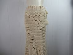 "Vintage 1970s hippy crochet skirt. Made of antique white cotton. Bohemian hippy style. Floor length with a drawstring waist. Crocheted on the bias so it is form fitting. Slight fish tail at bottom. No label. About a size medium. Actual measurements are: 32\"(adjusts bigger with drawstring) around the waist 38\" (stretches to 42\") around the hips 40\" overall length In very good condition." Hippy Crochet, Hippy Skirt, 1970s Skirt, 1950s Skirt, Crochet Maxi Skirt, Hippy Style, Skirt Crochet, Crochet Skirt Pattern, Hippie Crochet