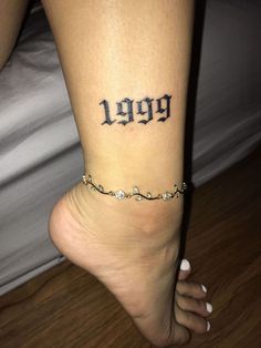 a woman's leg with a tattoo on it that reads, hogy and has the word harry potter written in cursive font