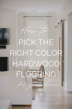 the words how to pick the right color hardwood flooring in this living room are overlaid