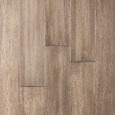 wood flooring that looks like it has been made from natural materials and is light brown