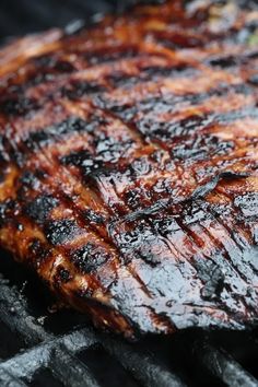 a close up of a steak on a grill